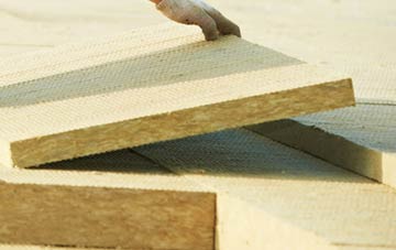 measuring Rollestone Camp tapered insulation